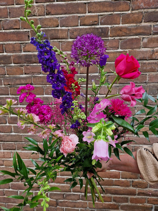 Los gebonden boeket roze/paars – vers boeket roze/paars, bloemist De Bloementuin Meppel